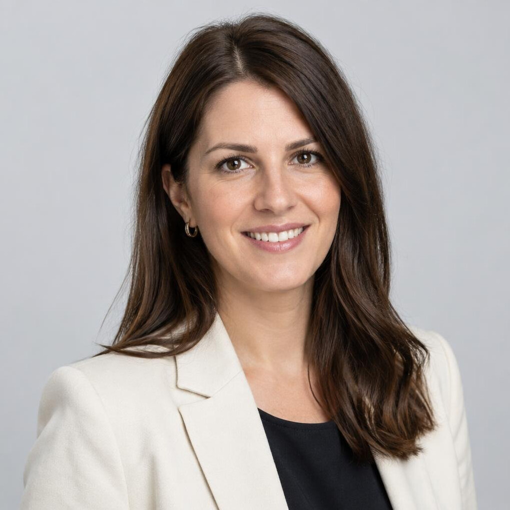 Portrait of a woman with brown hair smiling